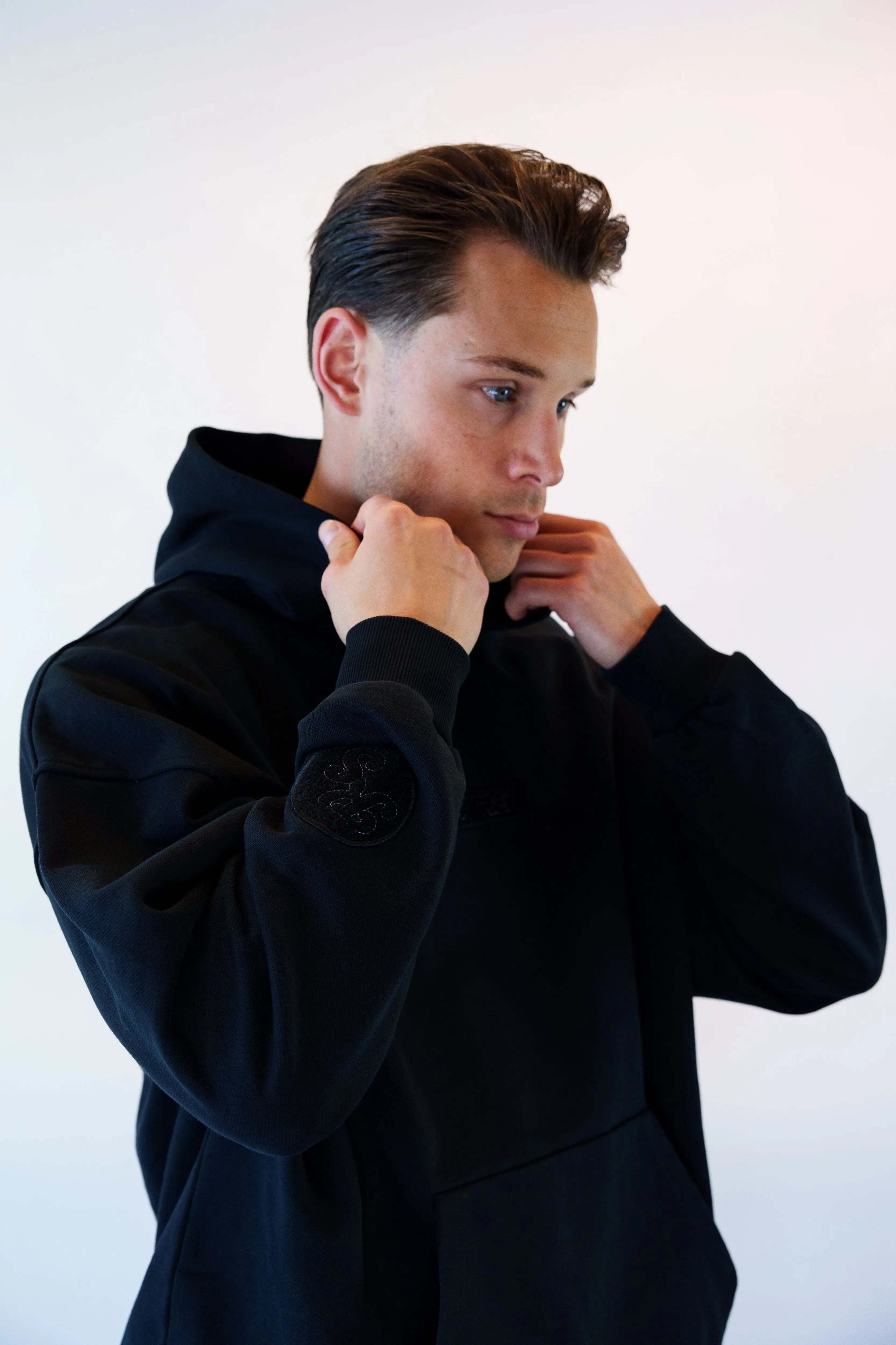 BADGE LOGO HOODIE BLACK - UNISEX Kickspired